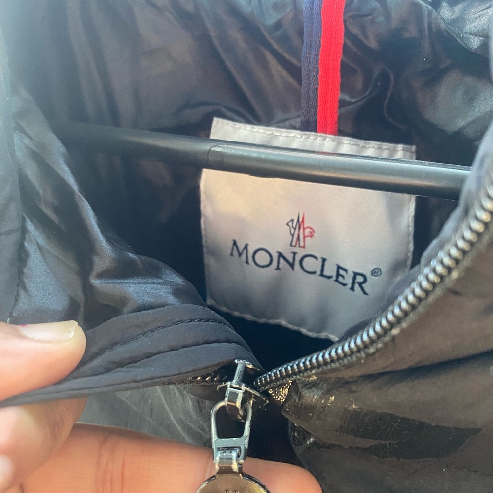 This is a moncler coat size Medium mens